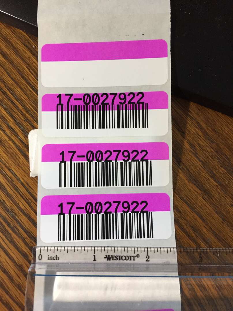 Label with purple stripe
